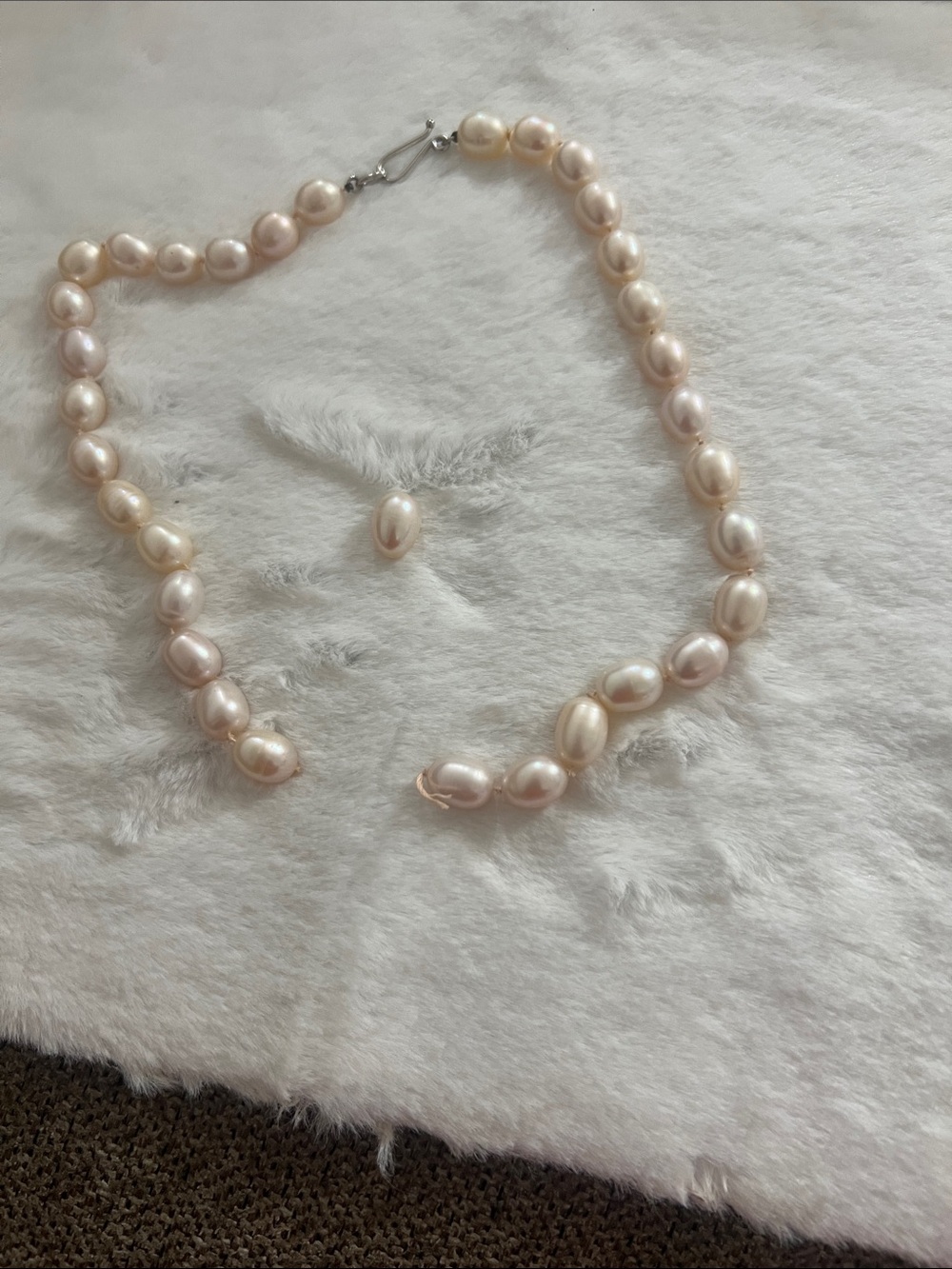 Pearl, broke, but can use as house decor or bring to a jewelry to redo!